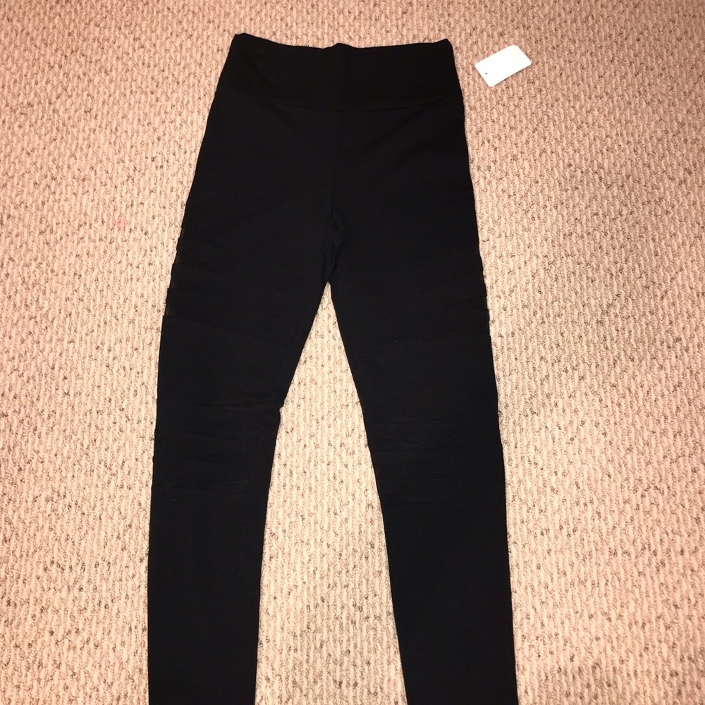 Brand new black leggings with mesh slits
